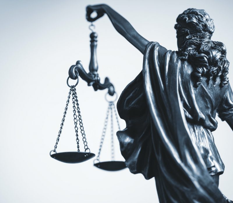 Cropped view of statue of Justice with the scales
